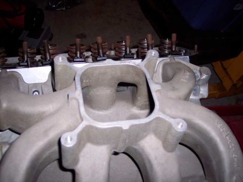 1971 Ford Mustang - This is a close-up view of an engine's intake manifold, showing the internal structure and valve springs.