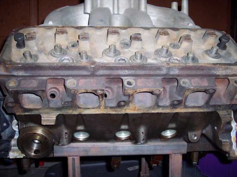 1971 Ford Mustang - Close-up view of an engine block and intake manifold, likely for a Ford vehicle.