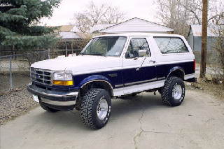 1994 Ford Bronco - This 1994 Ford Bronco is shown in a three-quarter front view, parked outdoors.