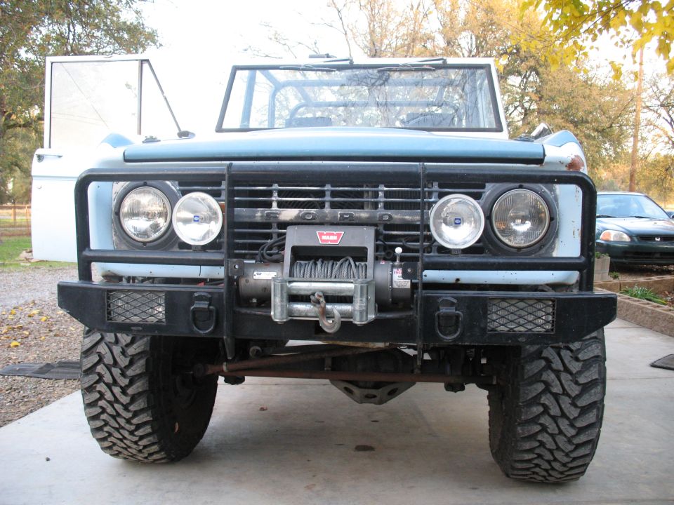 Warn winch, custom bumper, 1 ton steering.