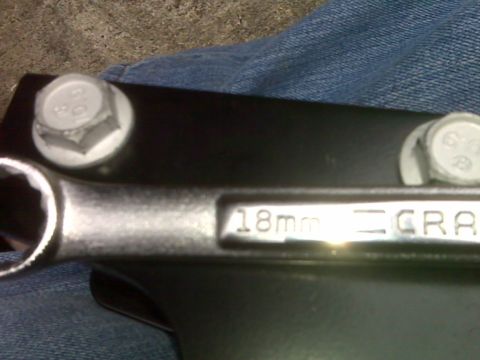 2008 Jeep Wrangler - An 18mm wrench is shown with two bolts.