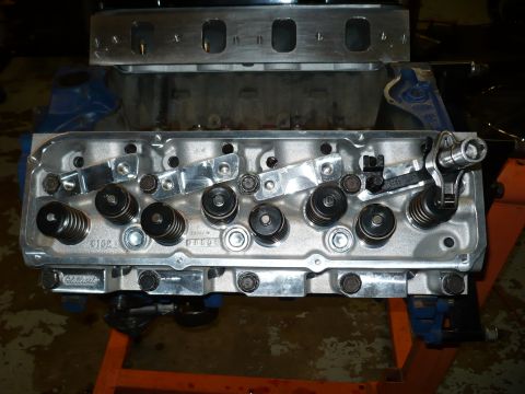 1973 Ford Ranchero - Close-up of an engine cylinder head assembly with internal components visible.