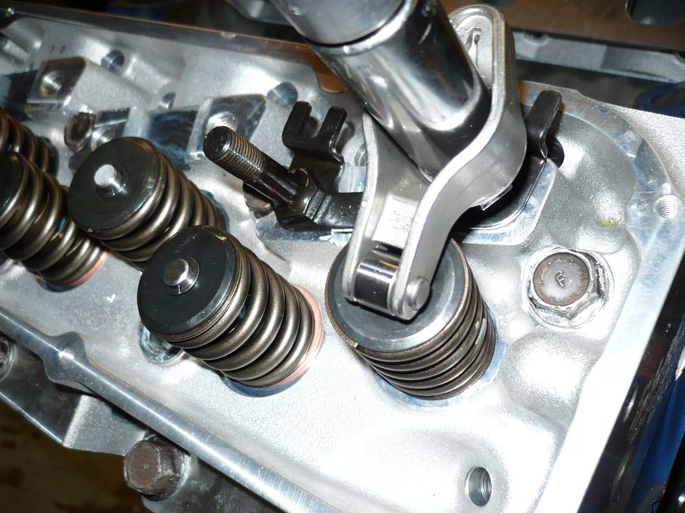 close-up of engine valve springs and rocker arm assembly