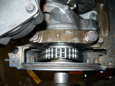 1973 Ford Ranchero - Close-up view of engine timing chain and gears, likely during a rebuild or repair.
