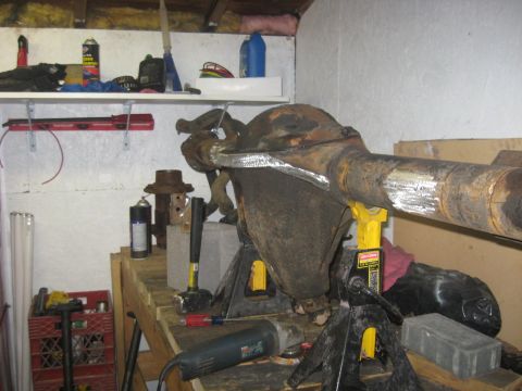 1988 Ford Bronco - Ground off the shock mounts. and started a shave a little on the diff.