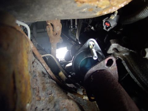 1990 Lincoln Town Car - I used the tire marker to ballpark the area where I would be adding the O2 sensor bung to the shorty. See the crude scribbling above the he…