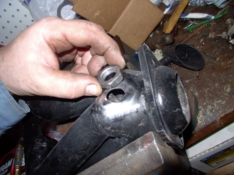 1990 Lincoln Town Car - I just drilled out a hole and enlarged it with a die grinder and stone, then tried the O2 bung/nut.