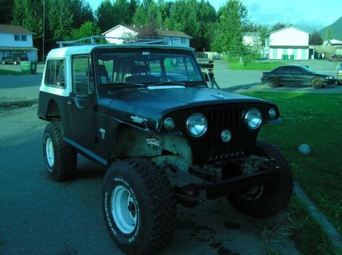 2001 Ford F-350 - This Jeep CJ-5 features a two-tone paint scheme and aggressive off-road tires, suggesting it's modified for terrain.