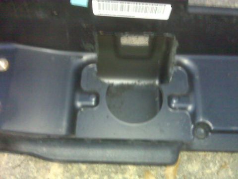2008 Jeep Wrangler - Close-up of a vehicle's front tow hook mount, with a barcode label visible above.
