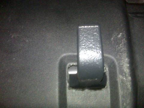 2008 Jeep Wrangler - A close-up view of a black plastic tow hook.