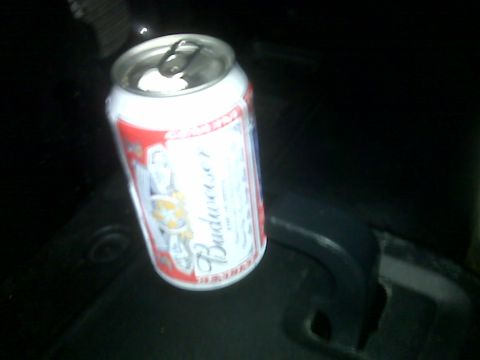 2008 Jeep Wrangler - A Budweiser can is visible on a dark surface, possibly inside a vehicle.