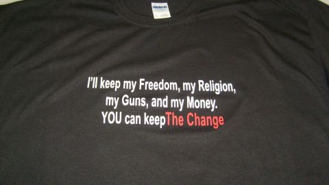 2006 Ford E250 - Black t-shirt text about freedom, religion, guns, money, and change.