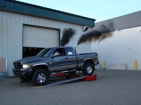 2002 Dodge 2500 - Dodge 2500 on a dynamometer, showing significant exhaust smoke.