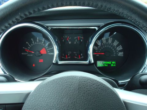 2007 Ford Mustang - The car's dashboard displays the speedometer, tachometer, and trip computer information.
