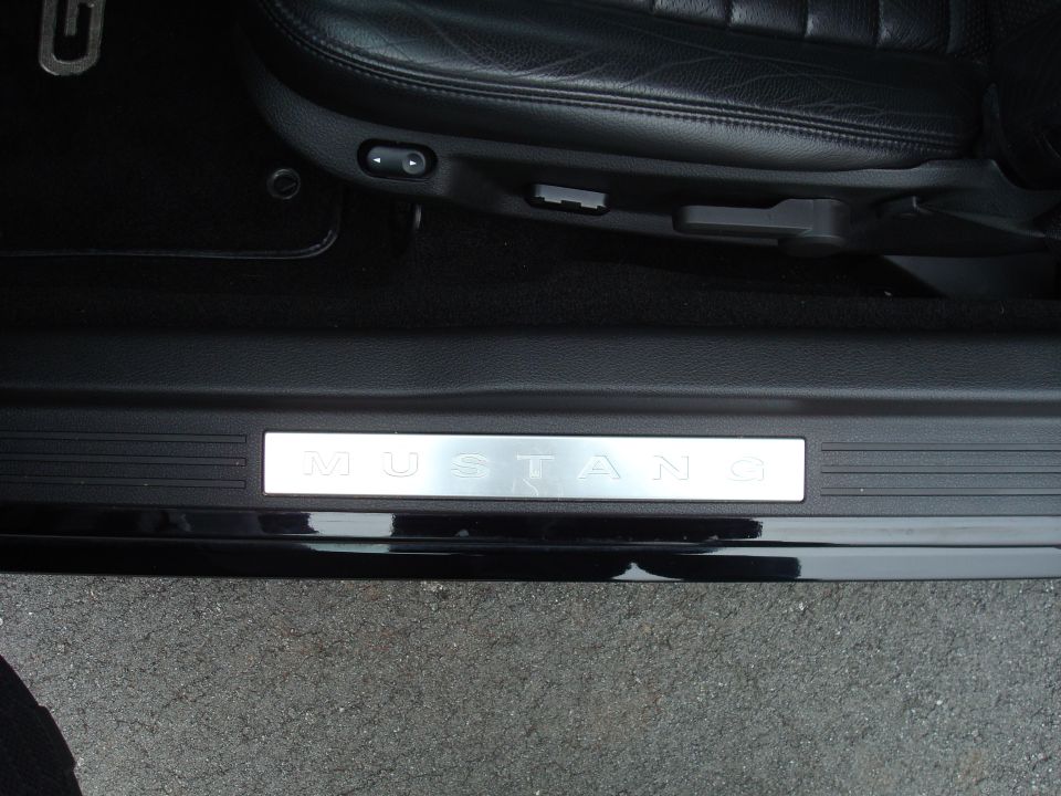 Ford Mustang door sill plate with brushed metal MUSTANG lettering