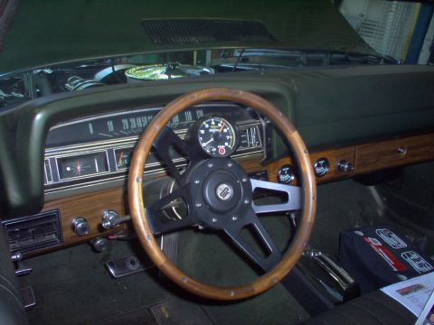 1970 Ford Ranchero - The interior of a 1970 Ford Ranchero shows its dashboard, steering wheel, and center console.