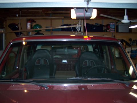 1991 Ford Bronco - Interior view of a 1991 Ford Bronco, racing seats and a steering wheel.