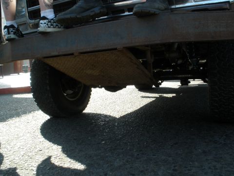 2008 Ford Bronco - The underside of a truck is visible, showing its heavy-duty components and tires.
