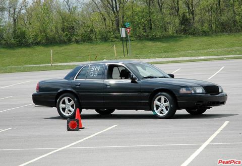 2003 Mercury Marauder - Black 2003 Mercury Marauder parked on asphalt with traffic cones nearby.