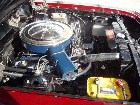 1969 Ford Torino - Engine bay of a 1969 Ford Torino, showing the V8 engine and associated components.