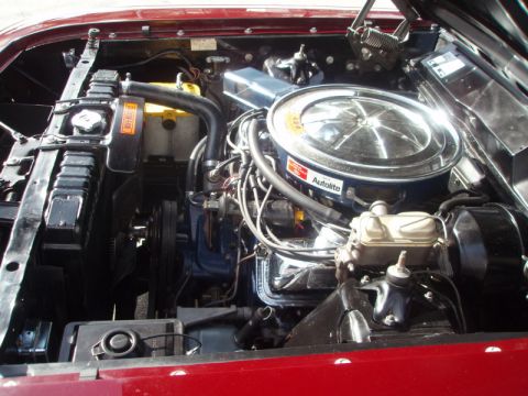 1969 Ford Torino - Close-up view of a car's engine bay, showing the V8 engine and its components.