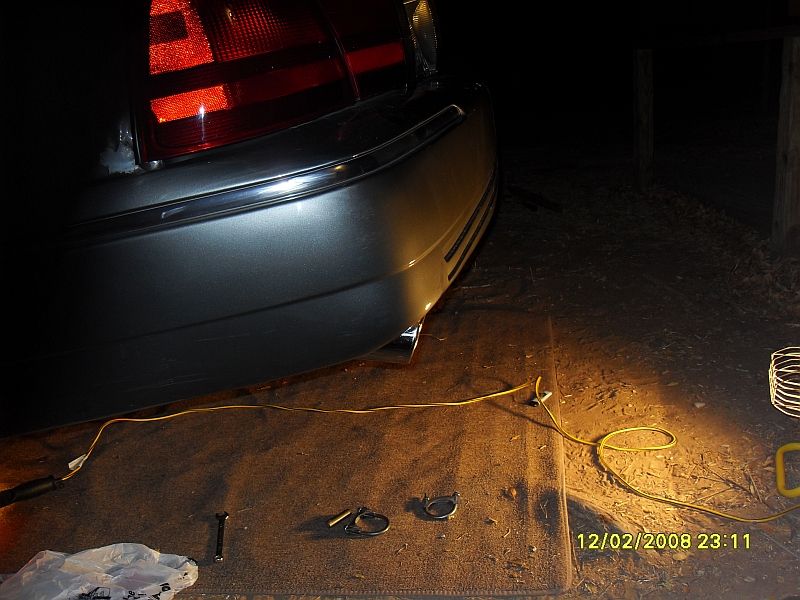 2004 Mercury Marquis rear bumper and taillight at night
