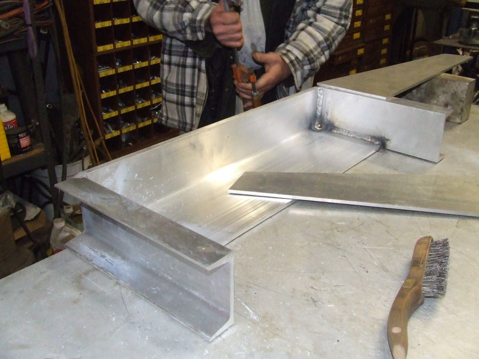 Metal fabrication project with I-beam and sheet metal components