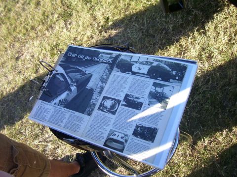 1979 Chevrolet Camaro - A document displays an article about a police car, with multiple images and text detailing its features and a pursuit.