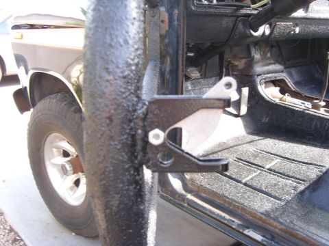 1978 Ford Bronco - Close-up of the interior of a 1978 Ford Bronco, focusing on the roll bar and dashboard area.