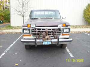 1990 Ford Bronco - This 1980s Ford truck is equipped with a plow mount on the front bumper.
