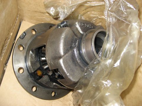 1996 Ford Bronco - A close-up view of a differential part, showing internal gears and a bolt flange.