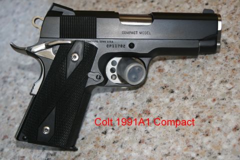 2007 Nissan Titan - A black Colt 1991A1 Compact pistol with textured grips is shown on a speckled surface.