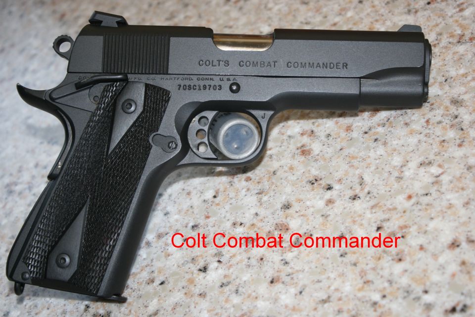 Colt Combat Commander pistol with textured grips and serial number 70SC19703
