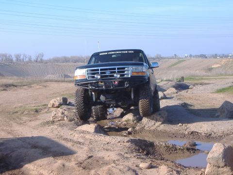 1995 Ford Bronco - This 1995 Ford Bronco is shown off-roading on a challenging course.