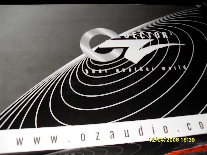 O.Z. Audio logo with concentric circles and text 'hear another world'. Website www.ozaudio.co visible