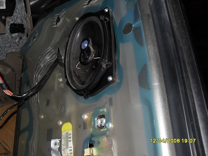 Car door panel interior with speaker installed