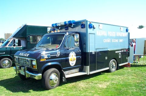 1991 Ford LTD Crown Victoria - Photograph of a Nashua Police Department crime scene unit box truck, not a technical document.