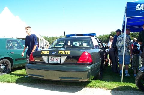 1991 Ford LTD Crown Victoria - Photograph of the rear of a State Police Ford Crown Victoria parked at a public event.