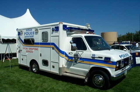 1991 Ford LTD Crown Victoria - Photograph of a Hudson Police Department special operations box truck parked on grass.