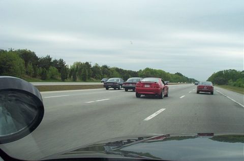 1991 Ford LTD Crown Victoria - Driving on the highway with several other vehicles on the road under an overcast sky.