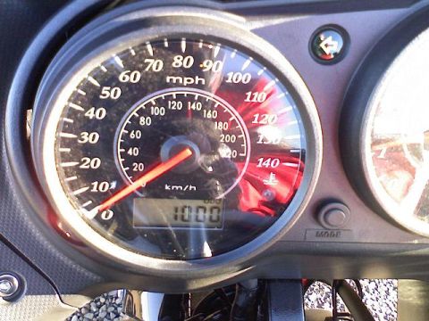 2008 Kawasaki Ninja R - The motorcycle's odometer reads 1000 miles, with the speedometer displaying both mph and km/h.