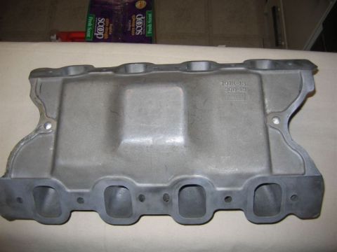 1972 Ford Ranchero - An aluminum intake manifold is shown, with visible part numbers stamped on its surface.