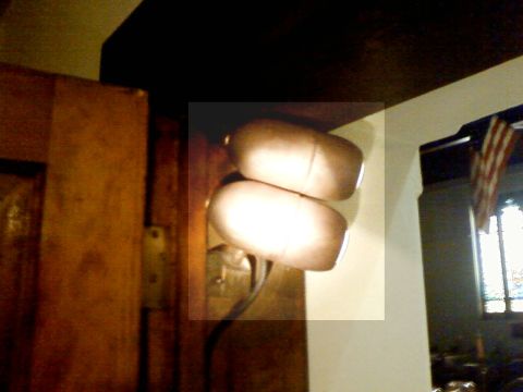 1995 Ford Bronco - Close-up of two large, round lights on a flexible stalk, possibly for a vehicle's interior or exterior.