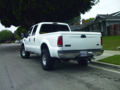 2001 Ford F-250 - This 2001 Ford F-250 pickup truck is seen from the rear on a residential street.