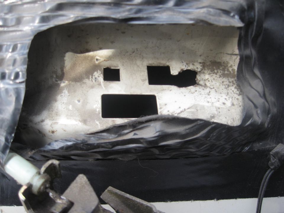 Interior metal panel with square and rectangular cutouts