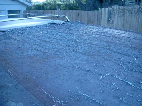 1990 Ford Bronco - The roof material is severely damaged and peeling, indicating a significant problem area.