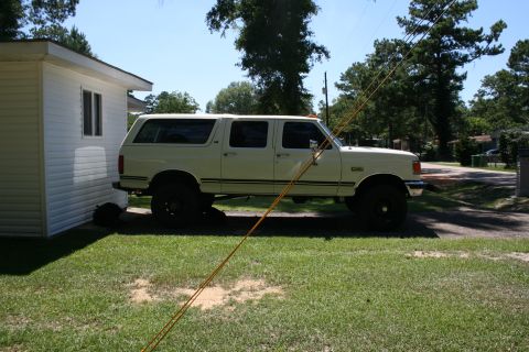 1991 Ford C-350 (Centurion Conversions) - Side view of a 1991 Ford C-350 (Centurion Conversions) extended cab pickup truck.