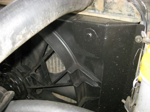 1979 Ford Bronco - A view of the radiator fan shroud and part of the cooling system.