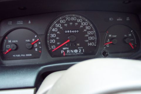 2001 Ford Crown Victoria - The dashboard of a 2001 Ford Crown Victoria shows the odometer reading and various operational gauges.