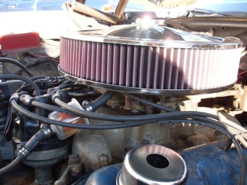 1972 Ford Ranchero - Close-up of an engine bay a chrome air cleaner with a purple filter element.